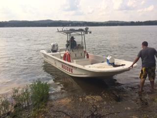 Members of the Cherokee County Rescue Squad preparing to retrieve vehicles from Weiss lake