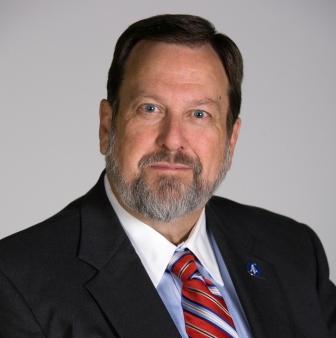 Professional portrait of District Attorney Mike O'Dell