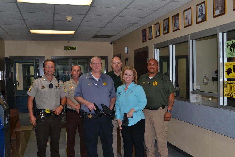 6 members of Cherokee County Sheriffs office with 2 newly acquired taser