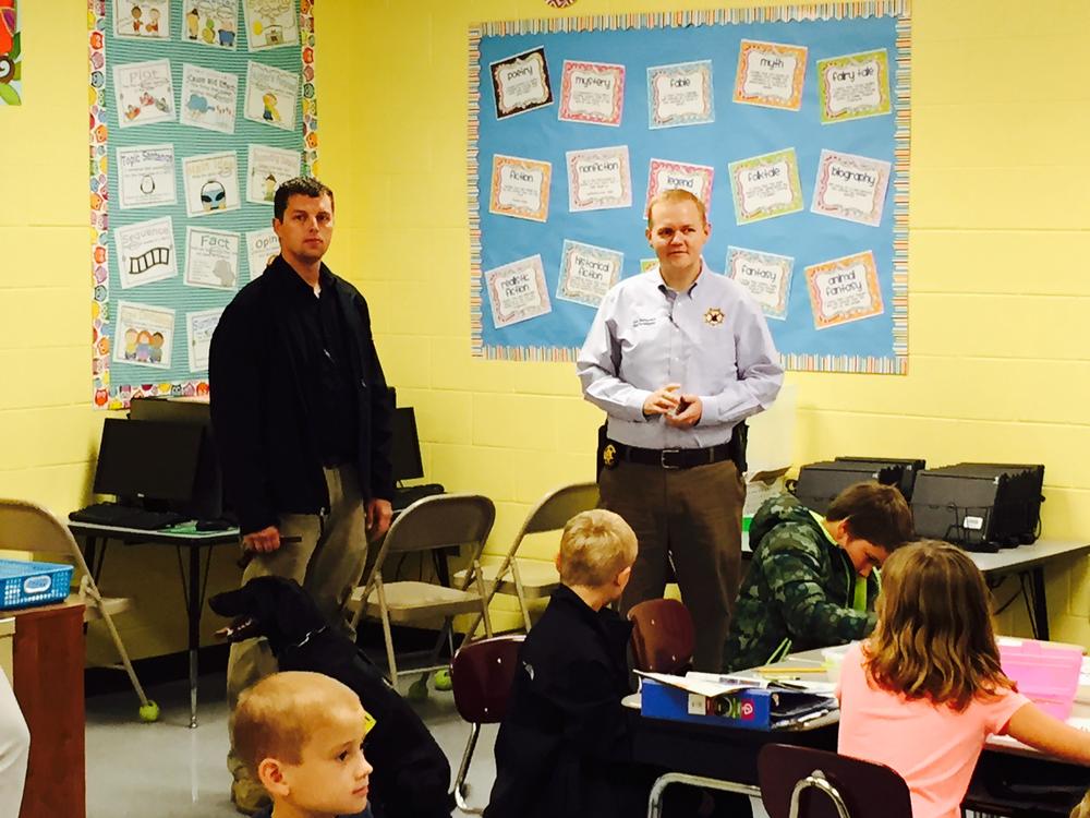 Investigators from Cherokee County Sheriffs office talk to students during Red Ribbon Week