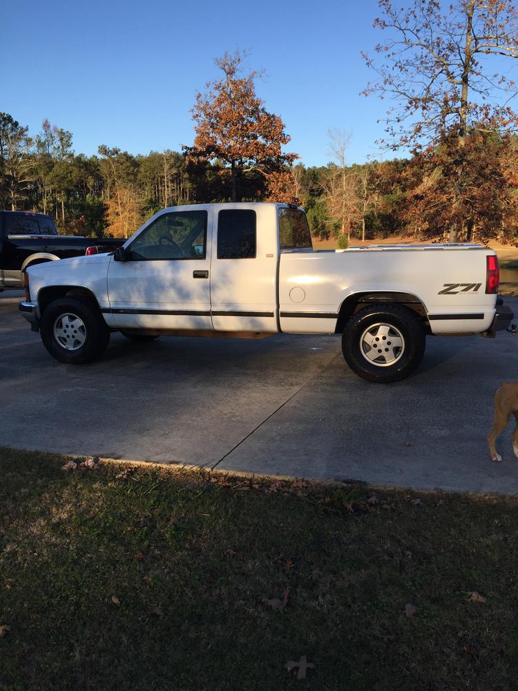 white 1995 Chevrolet Z71 pick-up truck that was stolen December 7, 2015 - driver side