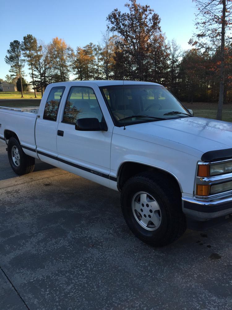 white 1995 Chevrolet Z71 pick-up truck that was stolen December 7, 2015 - passenger side