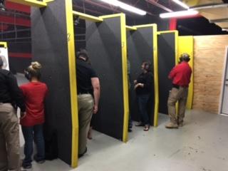 students practicing target shooting at the firearms range