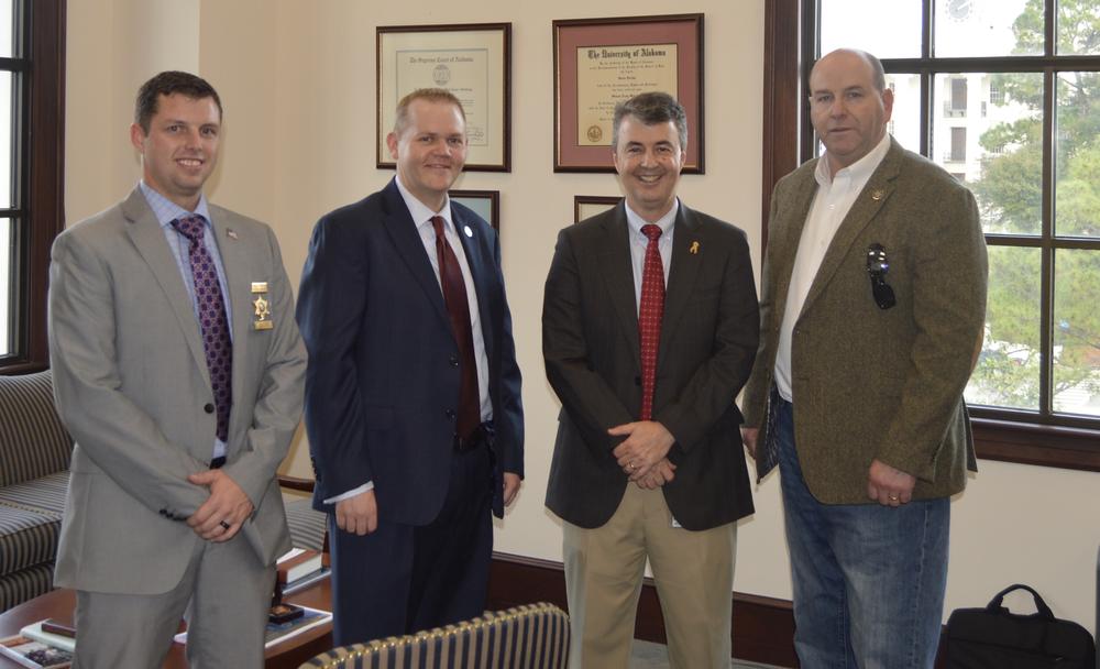 Chief Investigator Josh Summerford and Investigator Jeremy Stepps with other members of the ALEA