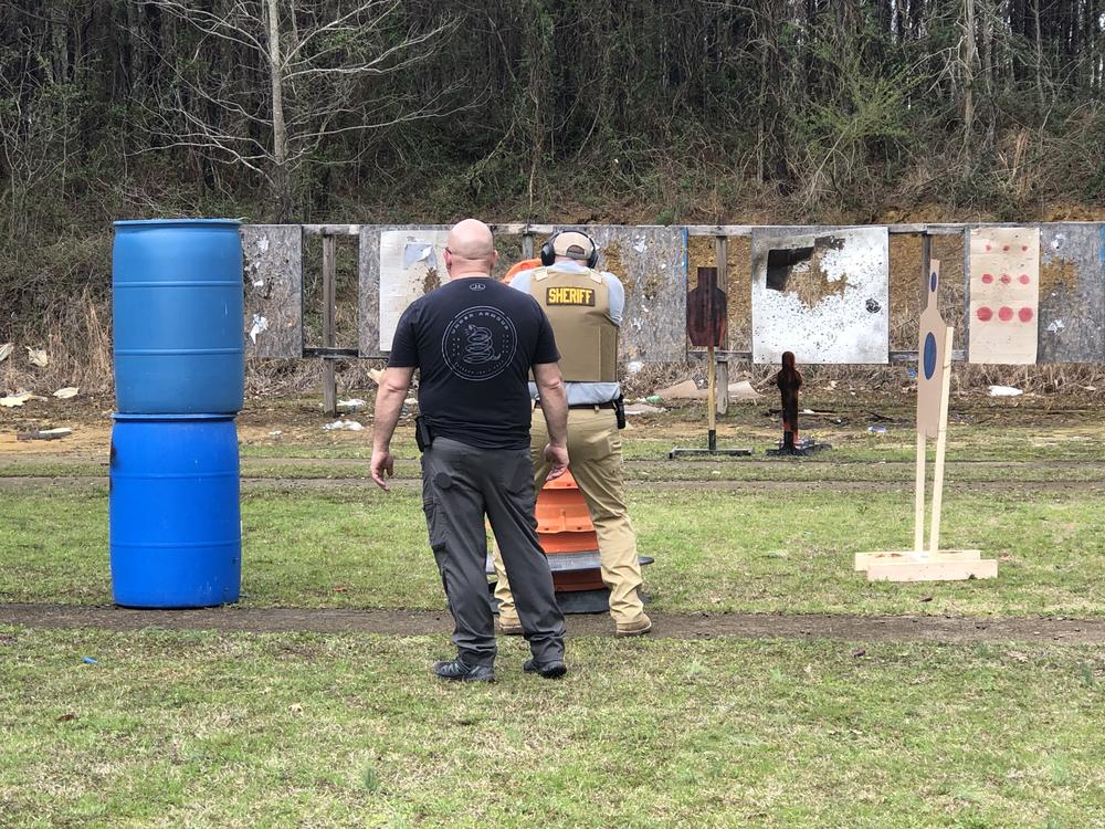 deputy using traffic cones as cover during active shooter training