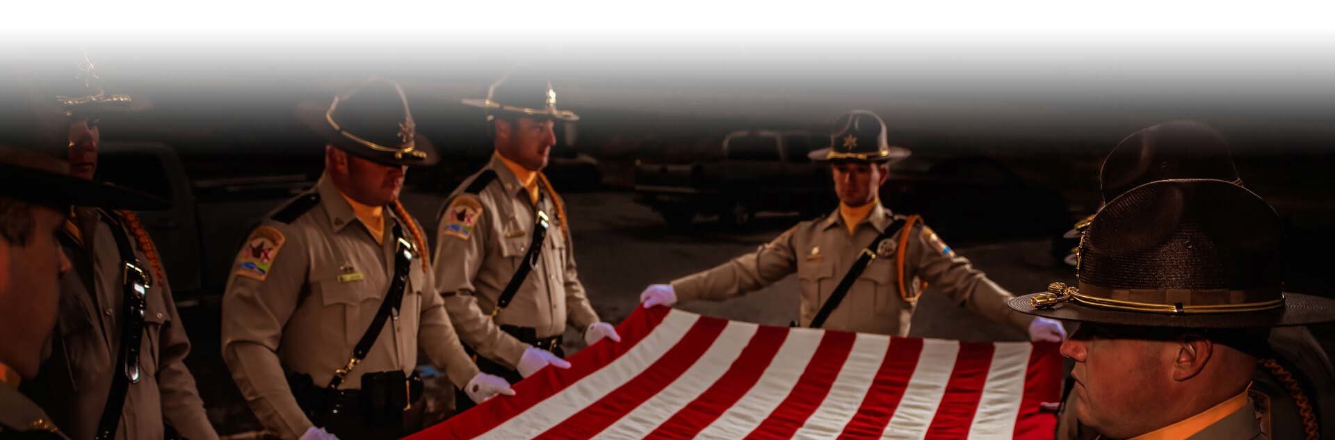 Honor guard folding the American Flag