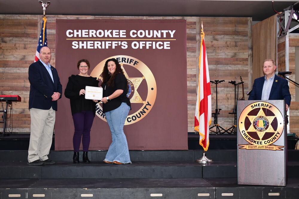 Correction Officer Sgt. Amanda Hamilton was awarded with the Hound Dog Award for B-Shift, along with CO Bill Bishop and CO Devin Smith (not pictured)