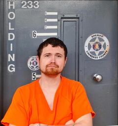 Mugshot of HENSON, TREVOR