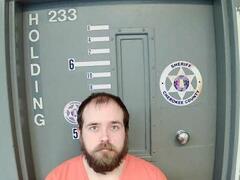 Mugshot of POPE, TYLER